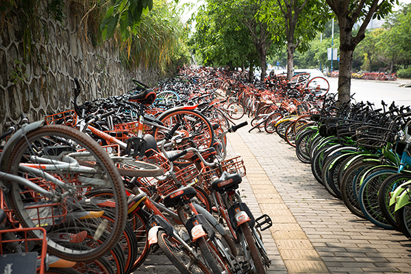 Apr,10,2018: Broken sharing bike crowded on the street in Guangzhou, China.